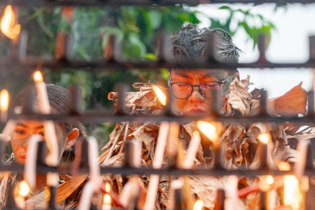 June 24, 2026, Manila, Manila, Philippines: Devotees spread mud on their bodies and put on banana leaves for the mass celebrating Taong Putik Festival in Bibiclat, Aliaga, Nueva Ecija every June 24. The festival honors Saint John the Baptist and honors a miracle during the Second World War, when the execution of Filipino prisoners of war was called off after a sudden downpour. Manila Philippines  - ZUMAs361 20260624_zip_s361_011 Copyright: xJyorxSox