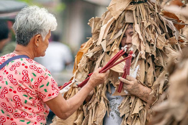 June 24, 2026, Manila, Manila, Philippines: Devotees spread mud on their bodies and put on banana leaves for the mass celebrating Taong Putik Festival in Bibiclat, Aliaga, Nueva Ecija every June 24. The festival honors Saint John the Baptist and honors a miracle during the Second World War, when the execution of Filipino prisoners of war was called off after a sudden downpour. Manila Philippines - ZUMAs361 20260624_zip_s361_009 Copyright: xJyorxSox