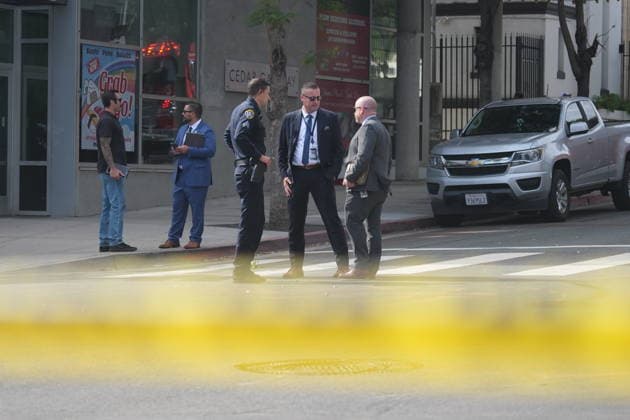 Officer shooting in San Diego, US - 23 Jun 2026 Police officers investigate at the scene after the shooting. San Diego police officers and firefighters respond to the Cedar Gateway apartment complex at Sixth Avenue and Cedar Street in the Cortez Hill neighborhood of downtown San Diego on Tuesday, June 23, 2026. Authorities said officers fatally shot a barricaded man after he allegedly threatened to kill his mother, threw household items from a fourth-floor apartment, and started a fire inside the unit. Residents were evacuated from the building as firefighters extinguished the blaze and investigators secured the scene. San Diego United States Copyright: xMichaelxHoxWaixLeex xSOPAxImagesx Michael Ho_5942