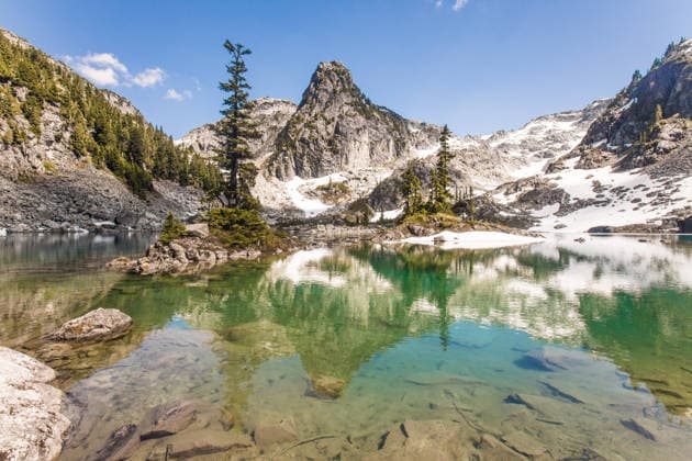 Wedgemount Lake reflecting snowy mountain peaks Squamish, British Columbia, Canada CR_JDIP260617A-2053335-01
