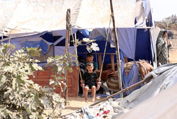 Displaced Palestinians inspect damaged tents after strike in Gaza City Displaced Palestinians inspect their heavily damaged tents near a displacement camp in the Sheikh Ajlin neighborhood, west of Gaza City, on June 24, 2026. An Israeli military strike overnight hit the coastal area where thousands of displaced families have sought shelter, leaving a large crater and causing extensive damage to displacement tents despite a ceasefire agreement being in force. Photo by Belal Osama apaimages Gaza Gaza Strip Palestinian Territory 240626_Gaza_BO_00(41) Copyright: xapaimagesxBelalxOsamax xapaimagesx