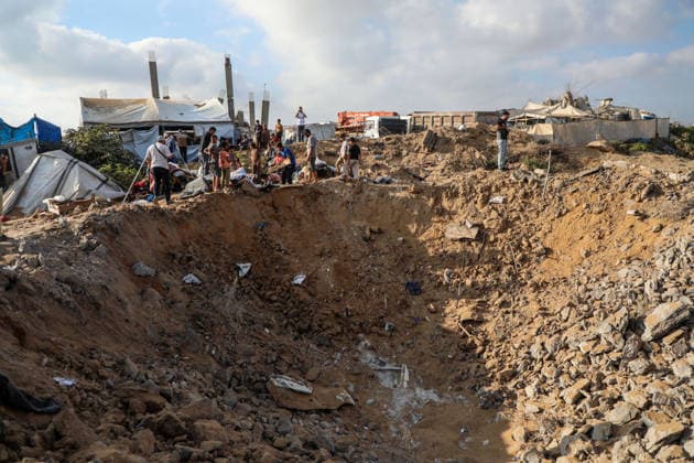 Israeli Airstrikes on Displaced Camp - Gaza Palestinians inspect the aftermath of an Israeli airstrike that targeted a camp housing displaced people s tents, southwest of Gaza City, on June 24, 2026. Photo by Rizek ELdremle ABACAPRESS.COM Gaza Palestine  Copyright: xEldremlexRizek ABACAx