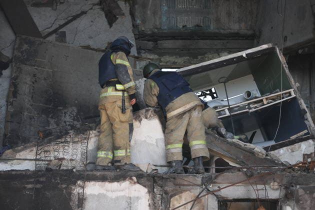 RUSSIA, GORLOVKA - JUNE 24, 2026: First responders of the Russian Emergencies Ministry work in an apartment block destroyed in a drone attack. Dmitry Yagodkin TASS  94215099