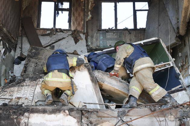 RUSSIA, GORLOVKA - JUNE 24, 2026: First responders of the Russian Emergencies Ministry work in an apartment block destroyed in a drone attack. Dmitry Yagodkin TASS  94215176