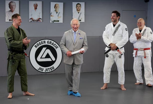 The King Hears How The Charity Reorg Uses Jiu Jitsu To Support Those Facing Physical, Mental And Social Challenges LONDON, ENGLAND - JUNE 24: King Charles III smiles as he receives a white belt during a visit to charity REORG at the Roger Gracie Brazilian Jiu Jitsu Academy on June 24, 2026 in London, England. REORG supports military personnel, veterans and emergency service workers through Brazilian Jiu Jitsu training in safe and supportive environments., Credit:Chris Jackson PA ROTA - B68 Avalon United Kingdom, England, London  Copyright: xChrisxJacksonx xPAxROTAx-xB68x xAvalonx 1112203151