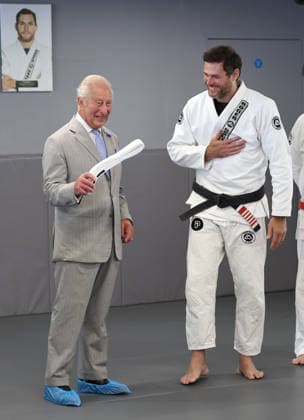 The King Hears How The Charity Reorg Uses Jiu Jitsu To Support Those Facing Physical, Mental And Social Challenges LONDON, ENGLAND - JUNE 24: King Charles III smiles as he receives a white belt from Roger Gracie (R) during a visit to charity REORG at the Roger Gracie Brazilian Jiu Jitsu Academy on June 24, 2026 in London, England. REORG supports military personnel, veterans and emergency service workers through Brazilian Jiu Jitsu training in safe and supportive environments., Credit:Chris Jackson PA ROTA - B68 Avalon United Kingdom, England, London  Copyright: xChrisxJacksonx xPAxROTAx-xB68x xAvalonx 1112203166