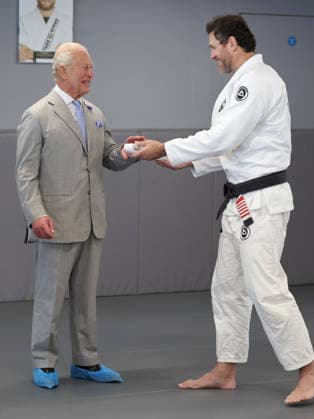 The King Hears How The Charity Reorg Uses Jiu Jitsu To Support Those Facing Physical, Mental And Social Challenges LONDON, ENGLAND - JUNE 24: King Charles III smiles as he receives a white belt from Roger Gracie (R) during a visit to charity REORG at the Roger Gracie Brazilian Jiu Jitsu Academy on June 24, 2026 in London, England. REORG supports military personnel, veterans and emergency service workers through Brazilian Jiu Jitsu training in safe and supportive environments., Credit:Chris Jackson PA ROTA - B68 Avalon United Kingdom, England, London  Copyright: xChrisxJacksonx xPAxROTAx-xB68x xAvalonx 1112203180
