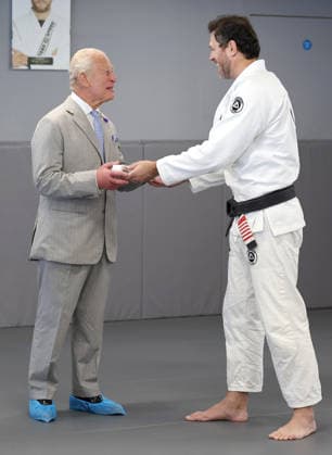 The King Hears How The Charity Reorg Uses Jiu Jitsu To Support Those Facing Physical, Mental And Social Challenges LONDON, ENGLAND - JUNE 24: King Charles III smiles as he receives a white belt from Roger Gracie during a visit to charity REORG at the Roger Gracie Brazilian Jiu Jitsu Academy on June 24, 2026 in London, England. REORG supports military personnel, veterans and emergency service workers through Brazilian Jiu Jitsu training in safe and supportive environments., Credit:Chris Jackson PA ROTA - B68 Avalon United Kingdom, England, London  Copyright: xChrisxJacksonx xPAxROTAx-xB68x xAvalonx 1112203220