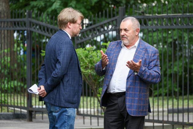RUSSIA, MOSCOW - JUNE 24, 2026: Yabloko Party chairman Nikolai Rybakov (L) and politician Boris Nadezhdin are seen outside the Zamoskvoretsky District Court holding a hearing into the case against Maxim Kruglov, a former member of the Moscow City Duma from the Yabloko Party. Kruglov is facing the charges of spreading false information about the Russian armed forces. Sergei Bulkin TASS  94218302