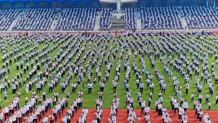 Traditional Andijan Polka dance performance enters Guinness World Records in Uzbekistan ANDIJAN, UZBEKISTAN - JUNE 24: Hundreds of performers dressed in traditional attire fill the entire field and running tracks of a stadium to perform the iconic national folk dance, Andijan polka, simultaneously in Andijan, Uzbekistan on June 24, 2026. The mass synchronized cultural event, which saw the participation of approximately 500 people, successfully entered the Guinness World Records. Bahtiyar Abdülkerimov Anadolu Andijan Uzbekistan. Editorial use only. Please get in touch for any other usage.  Copyright: x2026xAnadoluxBahtiyarxAbdülkerimovx