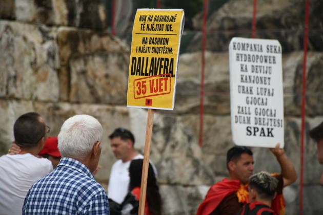 Demonstrations over controversial Vlora tourism project enter 25th day in Tirana TIRANA, ALBANIA - JUNE 24: Protesters gather at Skanderbeg Square despite the rain on the 25th day of demonstrations against a planned tourism development project in the Zvernec region of Vlora, holding banners with the slogan Albania is not for sale in Tirana, Albania on June 24, 2026. Olsi Shehu Anadolu Tirana Albania. Editorial use only. Please get in touch for any other usage.  Copyright: x2026xAnadoluxOlsixShehux