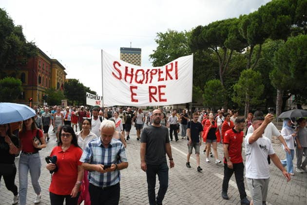 Demonstrations over controversial Vlora tourism project enter 25th day in Tirana TIRANA, ALBANIA - JUNE 24: Protesters gather at Skanderbeg Square despite the rain on the 25th day of demonstrations against a planned tourism development project in the Zvernec region of Vlora, holding banners with the slogan Albania is not for sale in Tirana, Albania on June 24, 2026. Olsi Shehu Anadolu Tirana World. Editorial use only. Please get in touch for any other usage.  Copyright: x2026xAnadoluxOlsixShehux