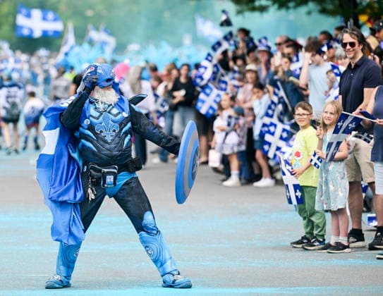 June 24, 2026, Montreal, Pq, Canada: A participant entertains the crowd during the Saint-Jean-Baptiste Day parade in Montreal, on Wednesday, June 24, 2026. Montreal Canada  - ZUMAc35_ 20260624_zaf_c35_080 Copyright: xGrahamxHughesx