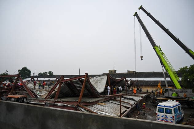 KOLKATA, INDIA - JUNE 24: NDRF and Army rescue personnel continue search and rescue survivor and victims from the collapsed warehouse at Taratala, Brace Bridge on June 24, 2026 in Kolkata, India. Five people were killed and 20 others injured after a 32,000 sq ft under-construction warehouse at Taratala came crashing down around 11.30 am on Wednesday, burying around 40 labourer under tonnes of concrete slabs, mangled iron beams, steel and corrugated tin sheets. (Photo by Samir Jana Hindustan Times) 5 Dead In Kolkata Warehouse Collapse