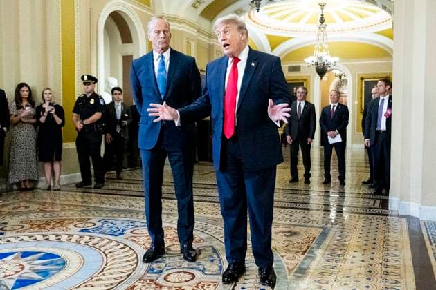 June 24, 2026, Washington, District Of Columbia, USA: U.S. President DONALD TRUMP, hands out speaking and gesturing with American U.S. Senators MIKE LEE (R-UT), RICK SCOTT (R-FL), and JOHN BARRASSO (R-WY), as they talk to reporters at the U.S. Capitol. Trump cancels bipartisan housing bill signing, reiterates demand for SAVE America Act. Washington USA - ZUMAb161 20260624_aap_b161_018 Copyright: xMichaelxBrochsteinx