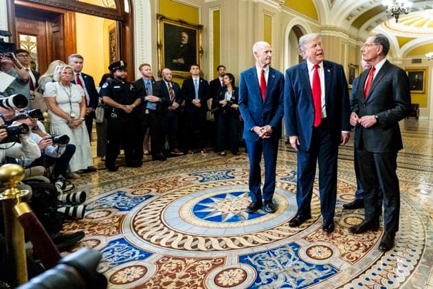 June 24, 2026, Washington, District Of Columbia, USA: U.S. President DONALD TRUMP, hands out speaking and gesturing with American U.S. Senators MIKE LEE (R-UT), RICK SCOTT (R-FL), and JOHN BARRASSO (R-WY), as they talk to reporters at the U.S. Capitol. Trump cancels bipartisan housing bill signing, reiterates demand for SAVE America Act. Washington USA - ZUMAb161 20260624_aap_b161_002 Copyright: xMichaelxBrochsteinx