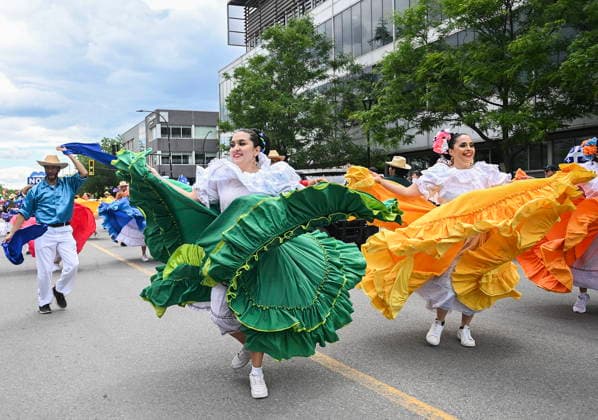 June 24, 2026, Montreal, Pq, Canada: Dancers entertain the crowd during the Saint-Jean-Baptiste Day parade in Montreal, on Wednesday, June 24, 2026. Montreal Canada  - ZUMAc35_ 20260624_zaf_c35_175 Copyright: xGrahamxHughesx