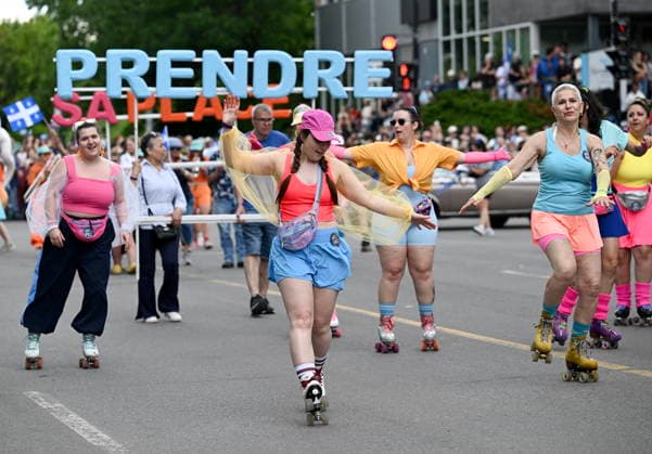 June 24, 2026, Montreal, Pq, Canada: Rollerbladers entertain the crowd during the Saint-Jean-Baptiste Day parade in Montreal, on Wednesday, June 24, 2026. Montreal Canada  - ZUMAc35_ 20260624_zaf_c35_185 Copyright: xGrahamxHughesx