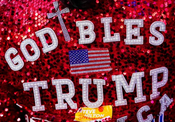 Attendees wear Trump and America themed cloths before President Donald Trump speaks at a rally to kick off the 16-day Great American State Fair as part of Washington, D.C. s celebration of the nation s 250th birthday on the National Mall on Wednesday, June 24, 2026. The rally will include military flyovers, musical performances from Lee Greenwood and Christopher Macchio, and the U.S. Army Band, the U.S. Marine Band and Armed Forces choirs.  WAP2026062435034 BONNIExCASH