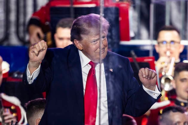 US President Donald Trump dances after speaking at the opening concert of the Freedom 250 Great American State Fair on the National Mall in Washington, DC, on Wednesday, June 24, 2026. Numerous performers dropped out of the embattled event, citing its association with the Trump administration. In response, Trump announced he would appear in lieu of the musicians for what he called a rally to end all rallies.  WAX20260620201 JIMxLOxSCALZO