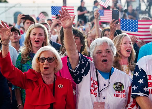Attendees hold American flags before President Donald Trump speaks at a rally to kick off the 16-day Great American State Fair as part of Washington, D.C. s celebration of the nation s 250th birthday on the National Mall on Wednesday, June 24, 2026. The rally will include military flyovers, musical performances from Lee Greenwood and Christopher Macchio, and the U.S. Army Band, the U.S. Marine Band and Armed Forces choirs. Copyright: xBonniexCashx xPoolxviaxCNPx MediaPunchx
