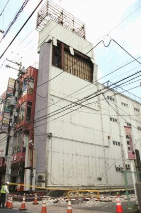 Powerful earthquake hits northeastern Japan Photo taken June 25, 2026, shows a building in Hachinohe, Aomori Prefecture, northeastern Japan, with its wall damaged by a preliminary-magnitude 7.2 earthquake that struck the region.  A14AA0005620173P