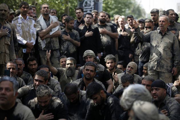 Mourners commemorate Karbala martyrs on Ashura in Iran??????? TEHRAN, IRAN - JUNE 25: Members of the Lur ethnic community take part in the traditional Gil-mali (mud-smearing) ritual during Ashura commemorations at Osshaghol Abbas Hosseiniyeh in Tehran, Iran, on June 25, 2026. Marking the anniversary of the martyrdom of Imam Hussein, the grandson of Prophet Muhammad, and his 72 companions in Karbala, participants covered themselves in mud as a sign of mourning and remembrance. Fatemeh Bahrami Anadolu Tehran Iran. Editorial use only. Please get in touch for any other usage.  Copyright: x2026xAnadoluxFatemehxBahramix