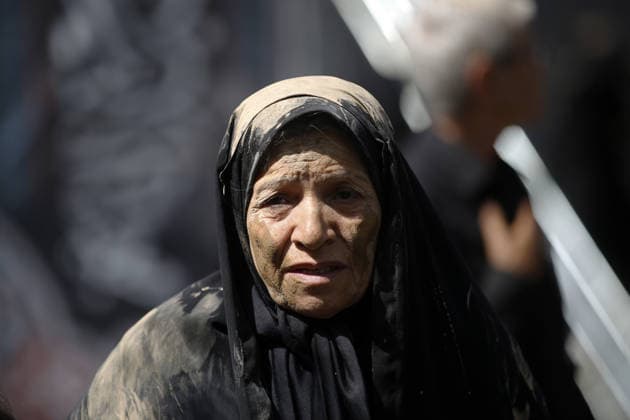 Mourners commemorate Karbala martyrs on Ashura in Iran??????? TEHRAN, IRAN - JUNE 25: Members of the Lur ethnic community take part in the traditional Gil-mali (mud-smearing) ritual during Ashura commemorations at Osshaghol Abbas Hosseiniyeh in Tehran, Iran, on June 25, 2026. Marking the anniversary of the martyrdom of Imam Hussein, the grandson of Prophet Muhammad, and his 72 companions in Karbala, participants covered themselves in mud as a sign of mourning and remembrance. Fatemeh Bahrami Anadolu Tehran Iran. Editorial use only. Please get in touch for any other usage.  Copyright: x2026xAnadoluxFatemehxBahramix