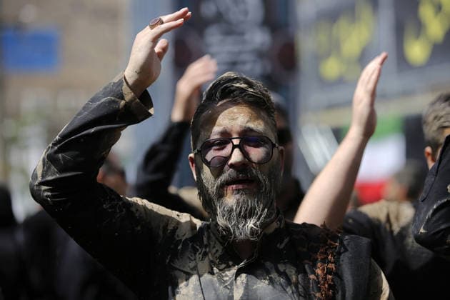 Mourners commemorate Karbala martyrs on Ashura in Iran??????? TEHRAN, IRAN - JUNE 25: Members of the Lur ethnic community take part in the traditional Gil-mali (mud-smearing) ritual during Ashura commemorations at Osshaghol Abbas Hosseiniyeh in Tehran, Iran, on June 25, 2026. Marking the anniversary of the martyrdom of Imam Hussein, the grandson of Prophet Muhammad, and his 72 companions in Karbala, participants covered themselves in mud as a sign of mourning and remembrance. Fatemeh Bahrami Anadolu Tehran Iran. Editorial use only. Please get in touch for any other usage.  Copyright: x2026xAnadoluxFatemehxBahramix