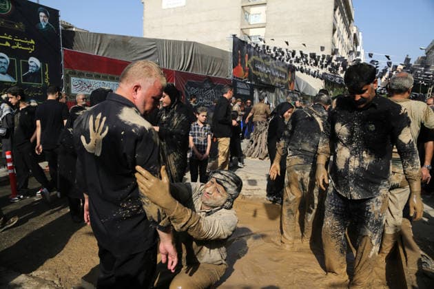 Mourners commemorate Karbala martyrs on Ashura in Iran??????? TEHRAN, IRAN - JUNE 25: Members of the Lur ethnic community take part in the traditional Gil-mali (mud-smearing) ritual during Ashura commemorations at Osshaghol Abbas Hosseiniyeh in Tehran, Iran, on June 25, 2026. Marking the anniversary of the martyrdom of Imam Hussein, the grandson of Prophet Muhammad, and his 72 companions in Karbala, participants covered themselves in mud as a sign of mourning and remembrance. Fatemeh Bahrami Anadolu Tehran Iran. Editorial use only. Please get in touch for any other usage.  Copyright: x2026xAnadoluxFatemehxBahramix