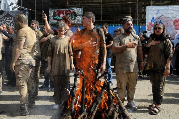 Mourners commemorate Karbala martyrs on Ashura in Iran??????? TEHRAN, IRAN - JUNE 25: Members of the Lur ethnic community take part in the traditional Gil-mali (mud-smearing) ritual during Ashura commemorations at Osshaghol Abbas Hosseiniyeh in Tehran, Iran, on June 25, 2026. Marking the anniversary of the martyrdom of Imam Hussein, the grandson of Prophet Muhammad, and his 72 companions in Karbala, participants covered themselves in mud as a sign of mourning and remembrance. Fatemeh Bahrami Anadolu Tehran Iran. Editorial use only. Please get in touch for any other usage.  Copyright: x2026xAnadoluxFatemehxBahramix