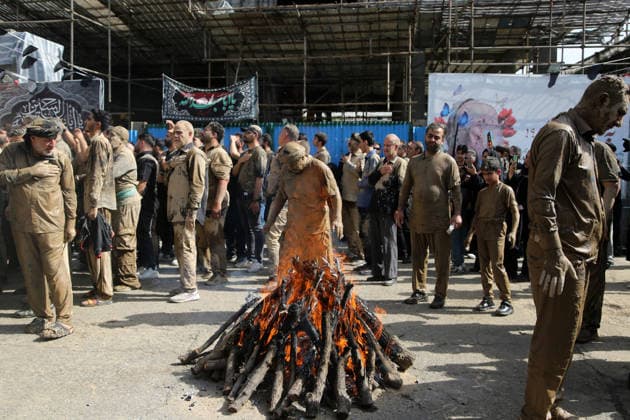 Mourners commemorate Karbala martyrs on Ashura in Iran??????? TEHRAN, IRAN - JUNE 25: Members of the Lur ethnic community take part in the traditional Gil-mali (mud-smearing) ritual during Ashura commemorations at Osshaghol Abbas Hosseiniyeh in Tehran, Iran, on June 25, 2026. Marking the anniversary of the martyrdom of Imam Hussein, the grandson of Prophet Muhammad, and his 72 companions in Karbala, participants covered themselves in mud as a sign of mourning and remembrance. Fatemeh Bahrami Anadolu Tehran Iran. Editorial use only. Please get in touch for any other usage.  Copyright: x2026xAnadoluxFatemehxBahramix