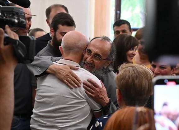 Armenia Archbishop Coup Plot Trial 9195163 25.06.2026 Archbishop Mikael Ajapahyan, head of the Shirak Diocese of the Armenian Apostolic Church, reacts after a hearing at the Court of Appeal in Yerevan, Armenia. The court released Ajapakhyan from house arrest and overturned the verdict of the Criminal Court of General Jurisdiction of Yerevan. On October 3, 2025 a Criminal Court of General Jurisdiction sentenced Ajapahyan to two years in prison for calling for the seizure of power and the violent overthrow of the constitutional order. Aram Nersesyan Sputnik Yerevan Armenia  Copyright: xAramxNersesyanx