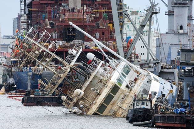RUSSIA, ST PETERSBURG - JUNE 25, 2026: Salvage operations are underway for the Kapitan Ushakov tugboat at the Baltic Shipyard. The vessel partially sank on 8 August 2025, after listing to its starboard during construction work; no injuries were reported. The damage was estimated by specialists from the North-Western Interregional Directorate of the Federal Service for Supervision of Natural Resources (Rosprirodnadzor) at 651 million rubles. Peter Kovalev TASS  94259110