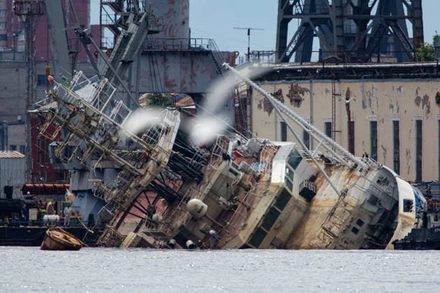 RUSSIA, ST PETERSBURG - JUNE 25, 2026: Salvage operations are underway for the Kapitan Ushakov tugboat at the Baltic Shipyard. The vessel partially sank on 8 August 2025, after listing to its starboard during construction work; no injuries reported. The damage was estimated by specialists from the North-Western Interregional Directorate of the Federal Service for Supervision of Natural Resources (Rosprirodnadzor) at 651 million rubles. Peter Kovalev TASS  94260509