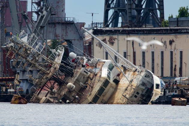 RUSSIA, ST PETERSBURG - JUNE 25, 2026: Salvage operations are underway for the Kapitan Ushakov tugboat at the Baltic Shipyard. The vessel partially sank on 8 August 2025, after listing to its starboard during construction work; no injuries reported. The damage was estimated by specialists from the North-Western Interregional Directorate of the Federal Service for Supervision of Natural Resources (Rosprirodnadzor) at 651 million rubles. Peter Kovalev TASS  94260511