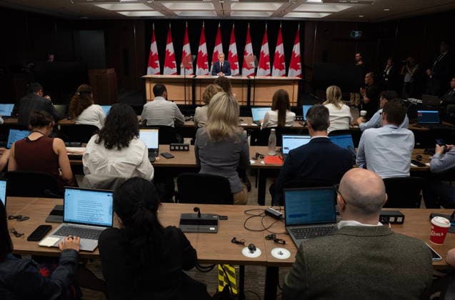 June 25, 2026, Ottawa, On, Canada: Reporters listen as Prime Minister Mark Carney responds to a question during a news conference in Ottawa, Thursday, June 25, 2026. Ottawa Canada  - ZUMAc35_ 20260625_zaf_c35_008 Copyright: xAdrianxWyldx