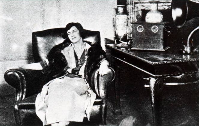 RECORD DATE NOT STATED Photograph of a woman sat listening to a radio Photograph of a woman sat listening to a radio broadcast. Dated 20th century Editorial use only. All other uses to be cleared with the copyright owner (World History Archive), in advance., WHA_102_0856.jpg, woman; listening; radio; broadcast; vintage; retro; 20th century; sitting; alone; nostalgia; technology; communication; entertainment; music; news; old-fashioned; leisure; relaxation; headphones; indoor; lifestyle; pastime; enjoyment; classic; history; media; audio; sound; broadcast; wireless Copyright: xx