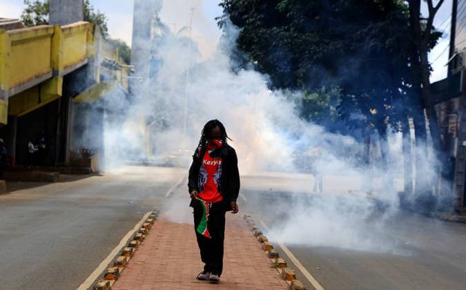 Protests in Kenya mark anniversary of finance bill demonstrations NAIROBI, KENYA - JUNE 25: A demonstrator is seen amid tear gas as people gather on the second anniversary of the Gen Z-led protests that erupted in 2024 against a controversial finance bill and resulted in dozens of deaths, in Nairobi, Kenya on June 25, 2026. Despite heavy police barricades and a blockade in the capital, families of the victims, activists, and citizens gathered in front of the parliament building to commemorate those who lost their lives. Lucas Mukasa Anadolu Nairobi Kenya. Editorial use only. Please get in touch for any other usage.  Copyright: x2026xAnadoluxLucasxMukasax