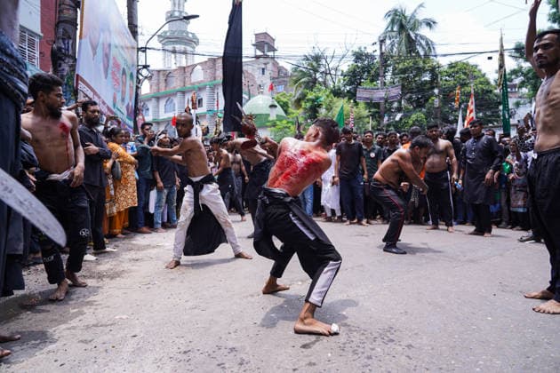June 26, 2026, Dhaka, Dhaka, Bangladesh: Dhaka, June 26, 2026: Marking the 10th day of Muharram, the holy day of Ashura, members of the Shia Muslim community observed the occasion with Tazia processions, matam (ritual mourning), and other religious ceremonies in remembrance of the martyrdom of Imam Hussain, the grandson of Prophet Muhammad, at the Battle of Karbala. The mourning procession began at the historic Hussaini Dalan in Old Dhaka and concluded at Zigatola. As part of the observance, some devotees donated chickens and pigeons as acts of charity and devotion. People from different communities gathered along both sides of the roads to watch the Ashura procession, reflecting the day s profound religious and cultural significance. Dhak - ZUMAk185 20260626_zip_k185_022 Copyright: xRubelxKarmakerx