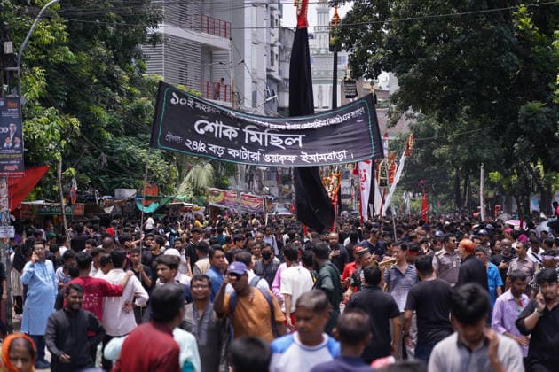 June 26, 2026, Dhaka, Dhaka, Bangladesh: Dhaka, June 26, 2026: Marking the 10th day of Muharram, the holy day of Ashura, members of the Shia Muslim community observed the occasion with Tazia processions, matam (ritual mourning), and other religious ceremonies in remembrance of the martyrdom of Imam Hussain, the grandson of Prophet Muhammad, at the Battle of Karbala. The mourning procession began at the historic Hussaini Dalan in Old Dhaka and concluded at Zigatola. As part of the observance, some devotees donated chickens and pigeons as acts of charity and devotion. People from different communities gathered along both sides of the roads to watch the Ashura procession, reflecting the day s profound religious and cultural significance. Dhak - ZUMAk185 20260626_zip_k185_023 Copyright: xRubelxKarmakerx