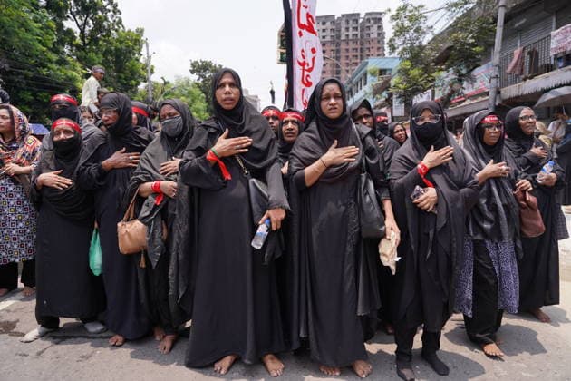 June 26, 2026, Dhaka, Dhaka, Bangladesh: Dhaka, June 26, 2026: Marking the 10th day of Muharram, the holy day of Ashura, members of the Shia Muslim community observed the occasion with Tazia processions, matam (ritual mourning), and other religious ceremonies in remembrance of the martyrdom of Imam Hussain, the grandson of Prophet Muhammad, at the Battle of Karbala. The mourning procession began at the historic Hussaini Dalan in Old Dhaka and concluded at Zigatola. As part of the observance, some devotees donated chickens and pigeons as acts of charity and devotion. People from different communities gathered along both sides of the roads to watch the Ashura procession, reflecting the day s profound religious and cultural significance. Dhak - ZUMAk185 20260626_zip_k185_028 Copyright: xRubelxKarmakerx