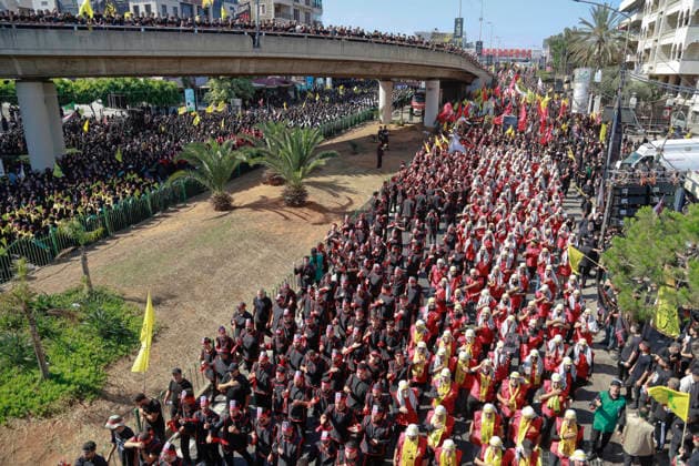 June 26, 2026, Beirut, Beirut, lebanon: Lebanese Shiite Muslims gather at the mausoleum of former Hezbollah Secretary-General Hassan Nasrallah following the recitation of the martyrdom of Imam Hussein before joining the Ashura procession marking the 10th day of Muharram in Beirut, Lebanon, on June 26, 2026. Thousands of mourners carrying flags and banners marched through the streets while performing traditional mourning rituals commemorating the Battle of Karbala and the martyrdom of Imam Hussein, the grandson of the Prophet Muhammad. Beirut lebanon - ZUMAb339 20260626_znp_b339_005 Copyright: xAbdulxKaderxAlxBayx