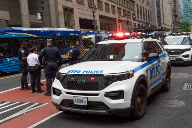 June 26, 2026, New York, New York, USA: Police officers respond as members of ACT UP New York begin Pride weekend with an act of civil disobedience blockading traffic during the morning rush hour on 42nd Street outside Grand Central Station stating solidarity with striking Delaney Hall immigrant detainees and denouncing Trump administration cuts to AIDS funding and healthcare. After traffic is at a standstill for approximately 40 minutes, NYPD arrests demonstrators. The protest banner is Ã¢â‚¬ËœMoney for AIDS and Healthcare Not for ICE and Warfare. Demonstrators defend New YorkÃ¢â‚¬â ¢s sanctuary city status as an ICE surge is promised and protest funding cuts to AIDS Drug Assistance Programs (ADAP,) The U.S. PresidentÃ¢â‚¬â ¢s Emergency P - ZUMAr174 20260626_znp_r174_017 Copyright: xGinaxMxRandazzox