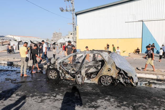 Palestinians inspect vehicle destroyed in Israeli airstrike in central Gaza Palestinians inspect a destroyed civilian vehicle after it was targeted in an Israeli airstrike on Salah al-Din Street in the Maghazi area of the central Gaza Strip, on June 26, 2026. The strike killed three Palestinians, according to local reports. Photo by Moiz Salhi apaimages Maghazi Gaza Strip Palestinian Territory 260626_Al_Maghazi_MS_00(6) Copyright: xapaimagesxMoizxSalhixx xapaimagesx