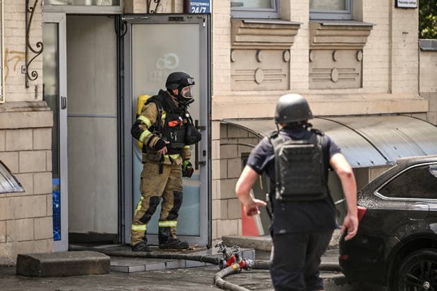 Rescuers from the State Emergency Service deal with the consequences of a Russian attack, Zaporizhzhia, Ukraine, June 26, 2026. In the afternoon, Russian forces launched two ballistic missiles at the city centre. The attack partially destroyed a one-storey office building, damaged warehouses, shattered windows and damaged the facades and roofs of nearby residential buildings, and set four cars on fire. At least 15 people were injured, including a nine-year-old child. (Photo by Dmytro Smolienko Ukrinform) Russian occupiers attack Zaporizhzhia with ballistic missiles  Copyright: xDmytroxSmolienkox