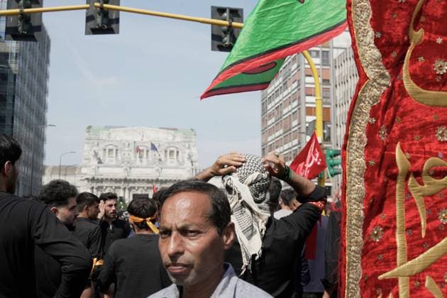 Ashura in Milan MILAN, Italy JUNE 26, 2026: Shia Muslim devotees participate in a Muharram procession through central Milan, beginning near Milano Centrale railway station, to commemorate the martyrdom of Imam Hussain, the grandson of Prophet Muhammad, and his companions who were killed in the Battle of Karbala in 680 AD. The annual observance is part of the Islamic month of mourning and honors the sacrifice, justice, and resistance symbolized by the events of Karbala. Milan Italy Copyright: x xcalogeroxrussox xJNAxPressx