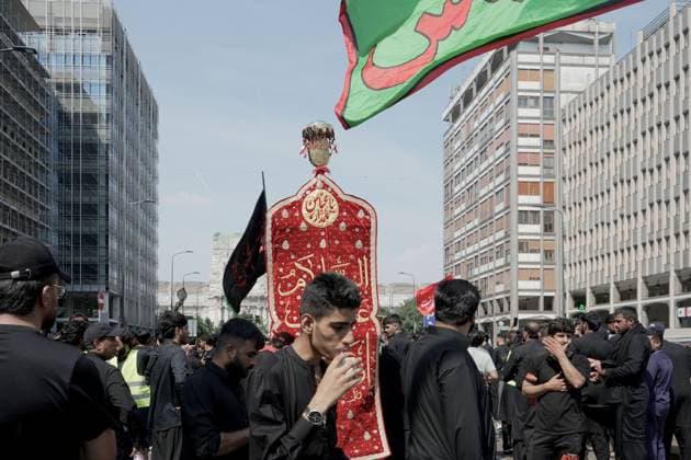 Ashura in Milan MILAN, Italy JUNE 26, 2026: Shia Muslim devotees participate in a Muharram procession through central Milan, beginning near Milano Centrale railway station, to commemorate the martyrdom of Imam Hussain, the grandson of Prophet Muhammad, and his companions who were killed in the Battle of Karbala in 680 AD. The annual observance is part of the Islamic month of mourning and honors the sacrifice, justice, and resistance symbolized by the events of Karbala. Milan Italy Copyright: x xcalogeroxrussox xJNAxPressx