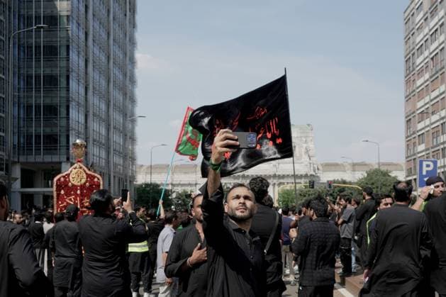 Ashura in Milan MILAN, Italy JUNE 26, 2026: Shia Muslim devotees participate in a Muharram procession through central Milan, beginning near Milano Centrale railway station, to commemorate the martyrdom of Imam Hussain, the grandson of Prophet Muhammad, and his companions who were killed in the Battle of Karbala in 680 AD. The annual observance is part of the Islamic month of mourning and honors the sacrifice, justice, and resistance symbolized by the events of Karbala. Milan Italy Copyright: x xcalogeroxrussox xJNAxPressx