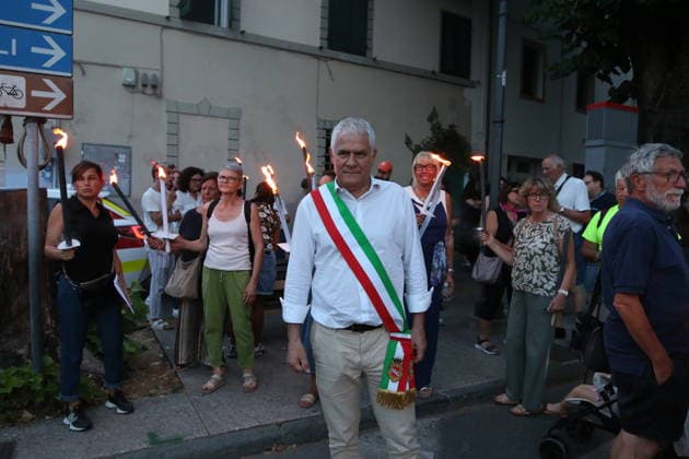 RECORD DATE NOT STATED IPA86100826 - Start of the torchlight procession to commemorate the victims of the double homicide in Camaiore. Leading the procession is Camaiore Mayor Marcello Pierucci  Copyright: xx xx 86100826.jpeg